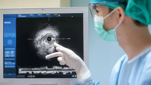 Sonographer performing cardiac ultrasound during emergency case in clinical setting