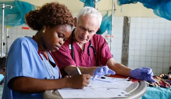 Medical Assistant works with patient