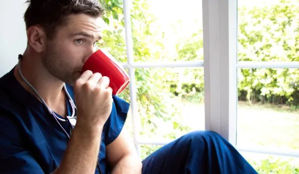 Night shift Nurse drinking coffee