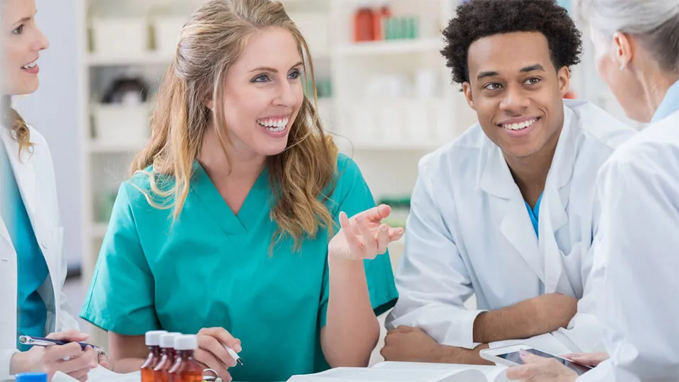 Young woman learns how to become a pharmacy tech