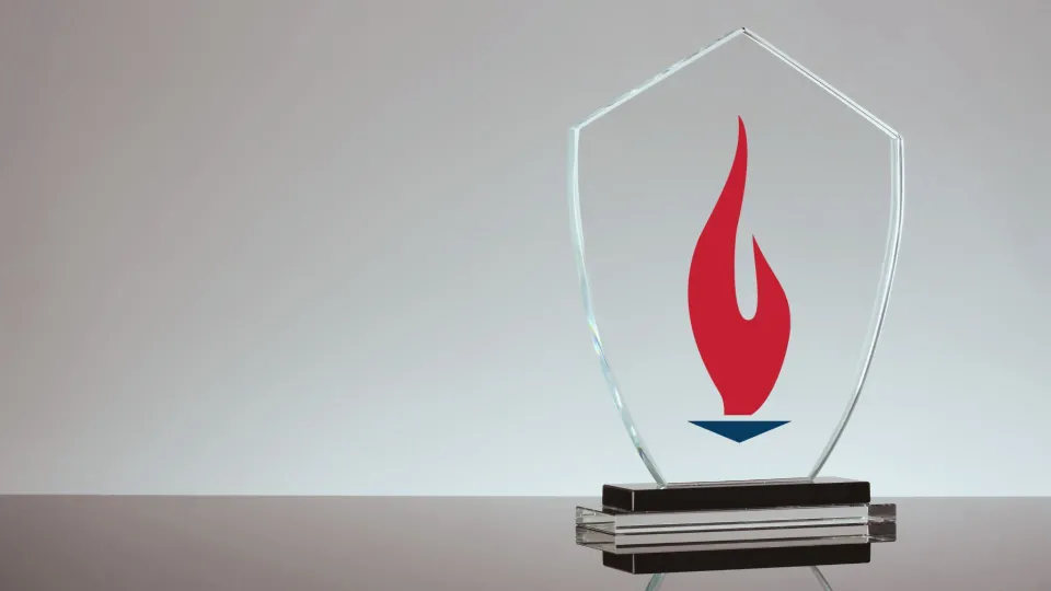 Clear Concorde Award with Torch on counter Clear Concorde Award with Torch on counter