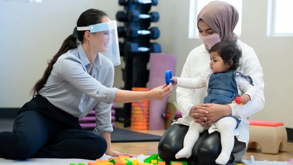 Occupational Therapy Assistant delivers culturally sensitive healthcare treatment to woman and her daughter. Occupational Therapy Assistant delivers culturally sensitive healthcare treatment to woman and her daughter.