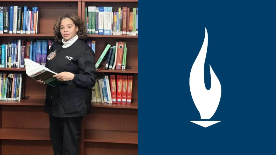 Selinza Mitchell holding a book in the learning resource center next to an image of the Concorde logo. Selinza Mitchell holding a book in the learning resource center next to an image of the Concorde logo.