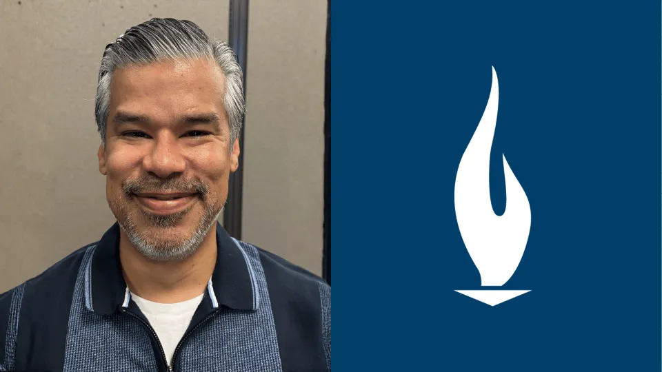 Jesus Solis, a respiratory therapist and instructor at Concorde San Antonio, smiles for camera in a headshot-style photo.