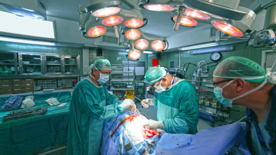 A surgical team operates on a patient A surgical team operates on a patient