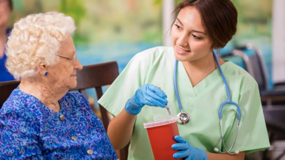 nurse disposing syringes