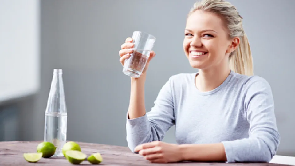 woman drinking water woman drinking water
